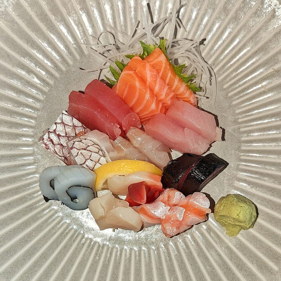 Assorted sashimi on a stone plate